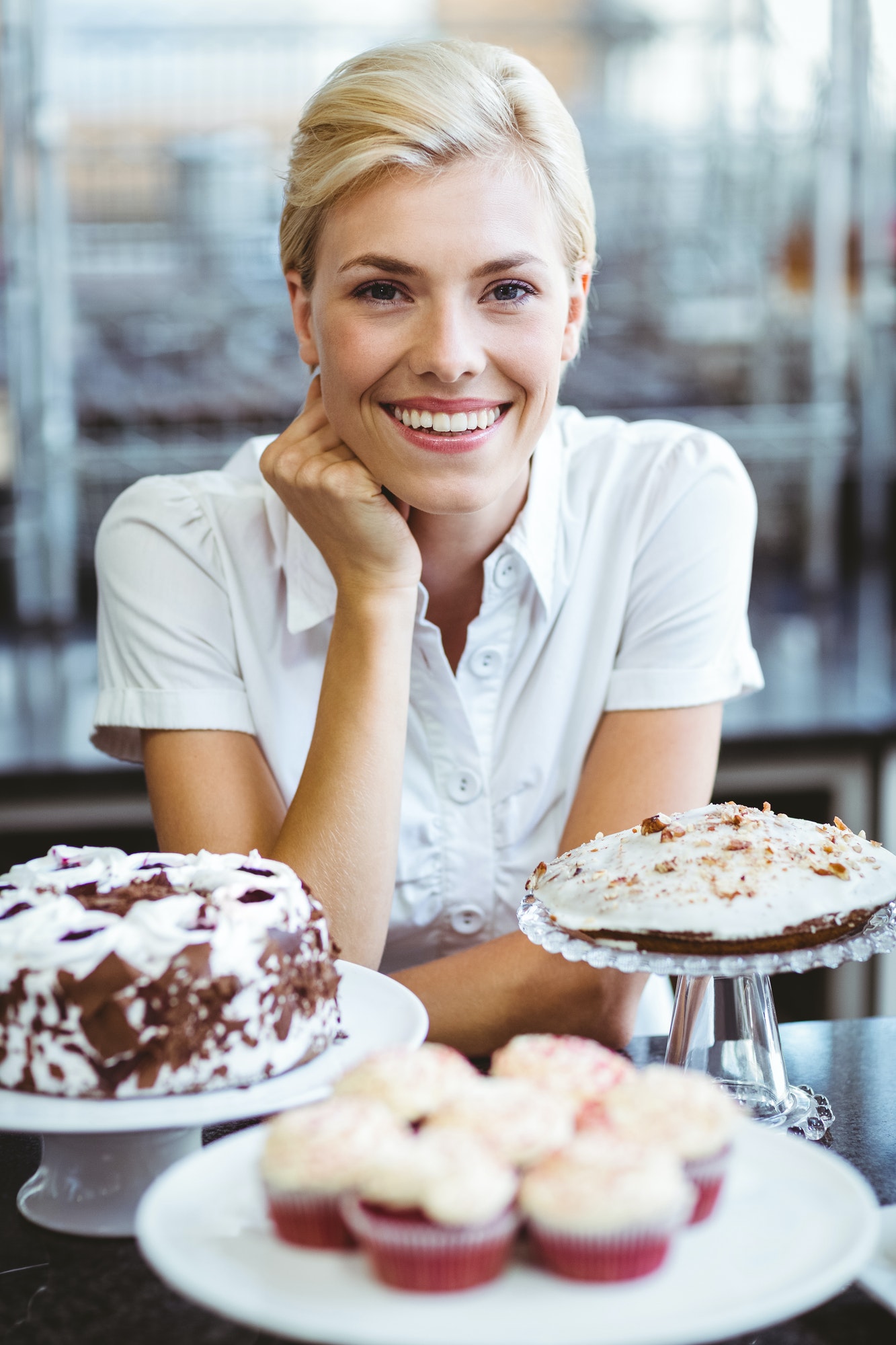 happy-pretty-woman-preparing-plate-of-cake.jpg